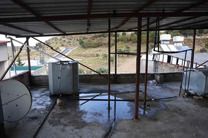 Hataylı vatandaşın yağmur suyu toplama sistemi ilgi odağı oluyor