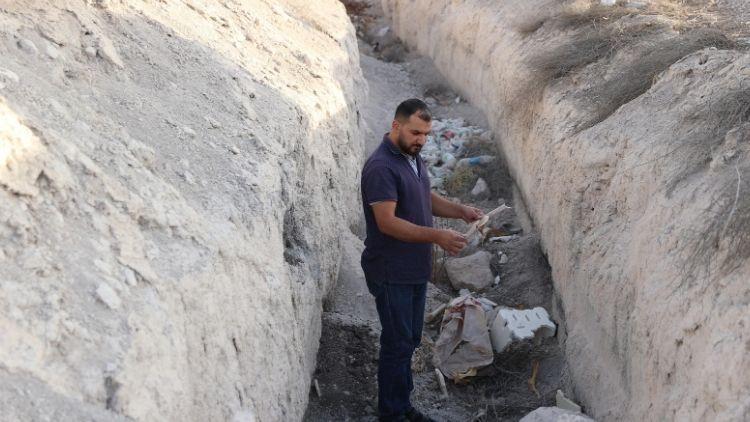 Suriye'de Tel alsawan Köyünde Toplu Mezarlar ve Çok Sayıda Ceset Bulundu