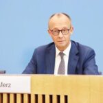 Almanyada CDU Liderinden Suriyelilere Geri Donus Uyarisi ve Davet